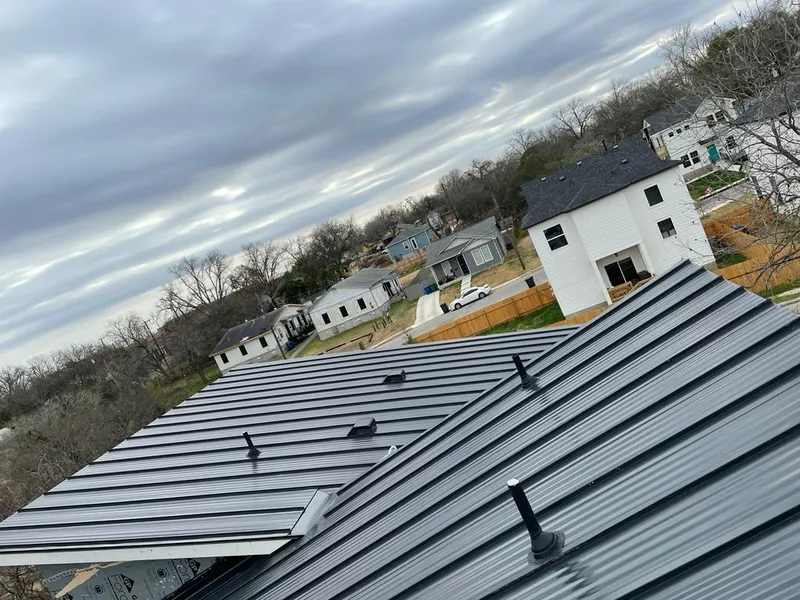 Standing seam metal roof panels with vents for Skylight Repair in Batavia